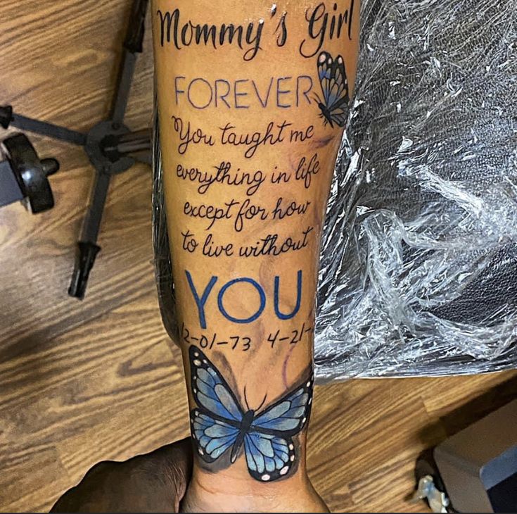 a person's arm with a butterfly tattoo on it and the words, mommy's girl forever you taught me everything in life except for how to live with you