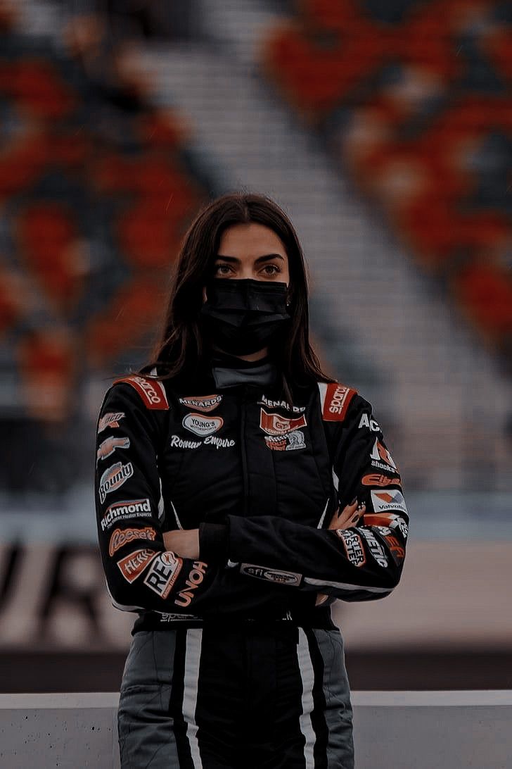 F1 Racer Aesthetic, Formula 1 Wife Aesthetic, Female Race Driver Aesthetic, Female Driver Aesthetic, Car Racing Outfit, Racing Girl Aesthetic, Formula 1 Race Outfit Women, Car Racer Aesthetic, F1 Woman Aesthetic