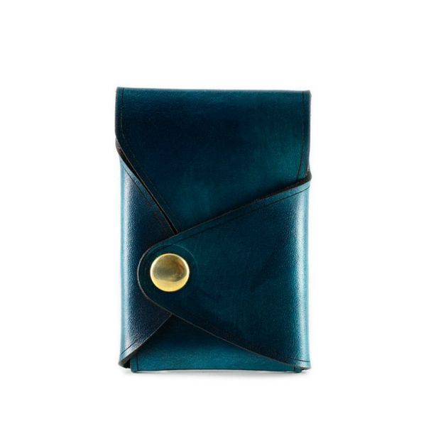 a blue leather wallet with a gold button on the front and an empty pocket in the back