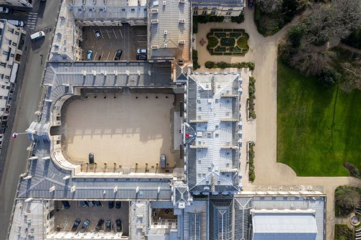 an aerial view of a large building with lots of windows