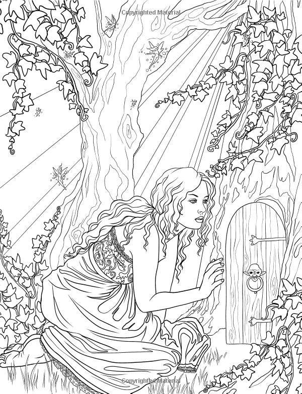 a woman sitting under a tree next to a door in the woods with flowers on it