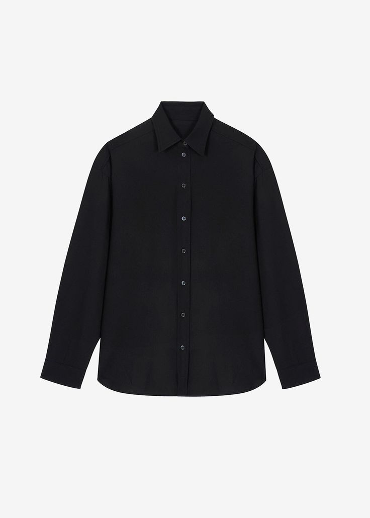 Color: Black Lightweight breathable shirting fabric Oversized fit Pointed collar Button front closure Button cuffs 65% Tencel 25% Rayon 10% Wool Dry Clean By The Frankie Shop. Imported Product Measurements: XS/S- 21" Shoulder, 49" Bust, 29" Length M/L- 21.5" Shoulder, 51" Bust, 29.5" Length Model is 175cm/5'9" wearing size XS/S Sleek Long Sleeve Shirt With Concealed Placket, Black Long Sleeve Top With Concealed Placket, Business Long Sleeve Tops With Concealed Placket, Timeless Long Sleeve Tops With Concealed Placket, Classic Black Blouse With Concealed Placket, Black Long Sleeve Tops With Hidden Button Closure, Black Long Sleeve Top With Hidden Button Closure, Black Collared Shirt With Concealed Placket, Sleek Button-up Shirt With Concealed Placket