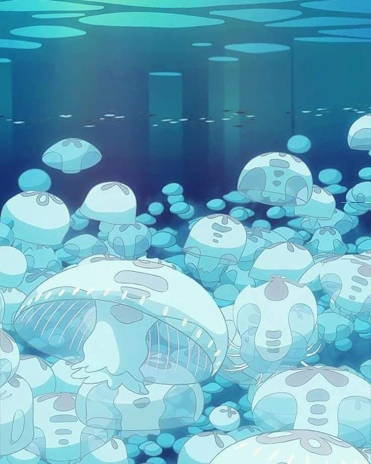 a bunch of jellyfish floating in the ocean with blue water and bubbles around them