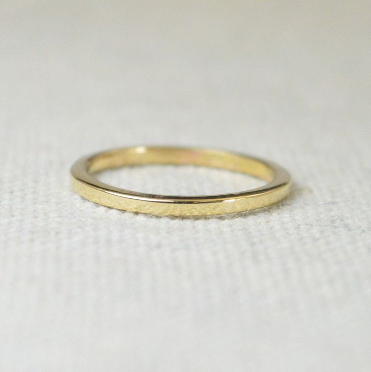 Solid Yellow Gold, Choose: 10k, 14k, 18, or 22k, 1.5mm x 1.5mm Band. Free inside ring engraving These Rings are Minimal & Simple - Heirloom Quality Gold Bands. Available in 10k, 14k, 18k, and 22k Solid gold. (14k gold ring shown) - Beautiful solid gold rings. - Shiny finish, You can also request a brushed finish in the personalization box. Hammered Texture can also be requested both brushed or shiny. - Made to order, just for you. - Free Inside Engravings. Each ring is made with high quality Simple 14k Yellow Gold Rings, Simple 14k Gold Engraved Ring For Anniversary, 14k Yellow Gold Bands As Gift, Minimalist Yellow Gold Rings With Decorative Band, Minimalist Yellow Gold Ring With Decorative Band, Minimalist Gold Stackable Rings For Anniversary, Simple Yellow Gold Bands For Gifts, Yellow Gold Rings With Simple Design, Minimalist Gold Diamond Cut Ring