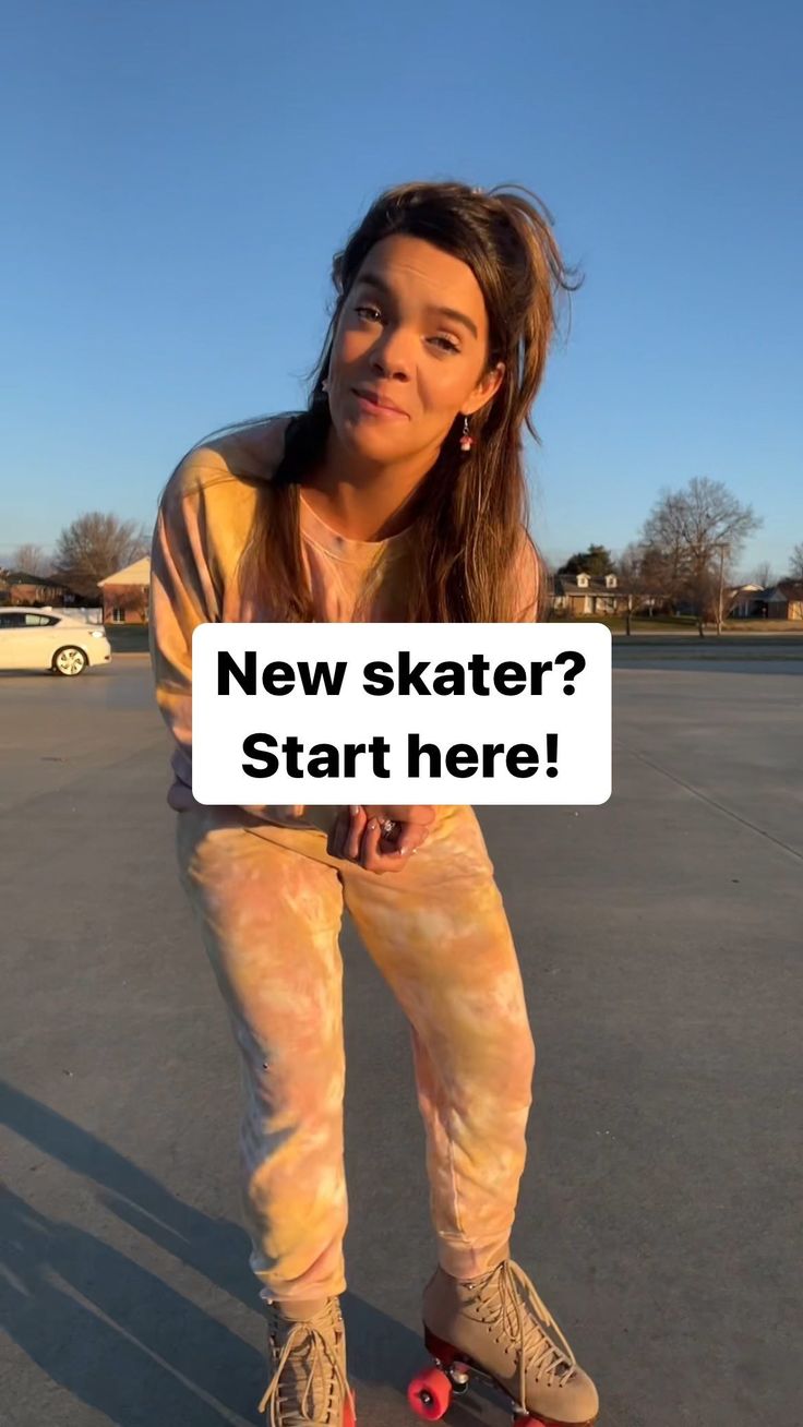 a young woman riding a skateboard on top of a parking lot with the caption new skater? start here