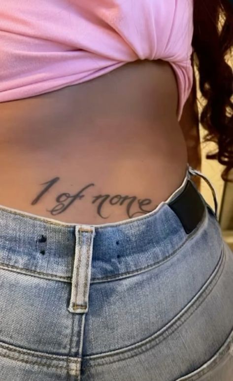 a woman's stomach with the words i love you tattooed on her lower back