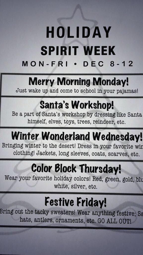 the holiday spirit week sign is posted in front of a building with black and white lettering