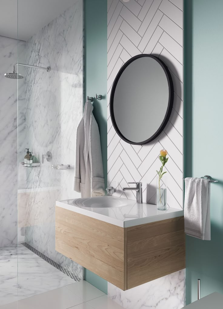 a bathroom with marble and wood accents