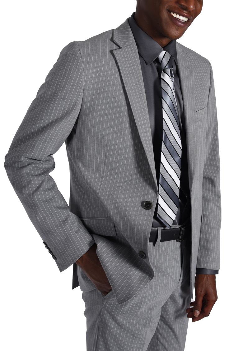 Sleek pinstripes distinguish a suit jacket and pants tailored in a trim fit for refined styling at any occasion. Jacket has notched lapels; four-button cuffs; chest pocket; flap pockets; back vent Lined 69% polyester, 29% rayon, 2% spandex Dry clean Imported Pinstripe Notch Lapel Blazer For Office, Pinstripe Blazer With Welt Pockets For Business Casual, Tailored Pinstripe Blazer For Office, Striped Tuxedo Suit For Business, Pinstripe Blazer With Suit Collar For Business Casual, Classic Pinstripe Blazer For Business, Classic Pinstripe Blazer With Notch Lapel, Pinstripe Notch Lapel Blazer For Business Casual, Pinstripe Fitted Single Breasted Blazer