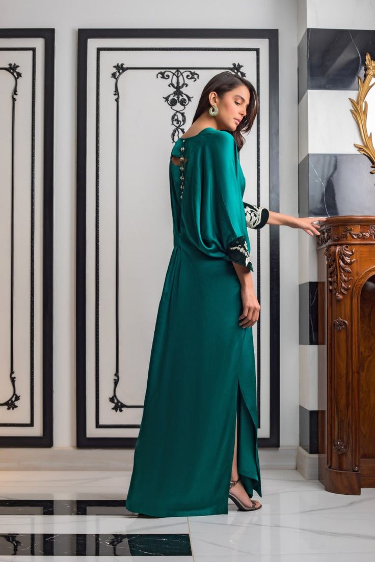 Teal Charmeuse Kaftan – Sania Maskatiya International Green Wedding Dress With Embroidered Sleeves, Green Embellished Silk Kaftan, Festive Green Dress With Embroidered Neckline, Elegant Green Gown With Floral Embroidery, Dress With Draped Sleeves For Party And Eid, Eid Party Dresses With Draped Sleeves, Party Dresses With Draped Sleeves For Eid, Eid Evening Dresses With Draped Sleeves, Elegant Kaftan With Floral Embroidery For Festive Occasions