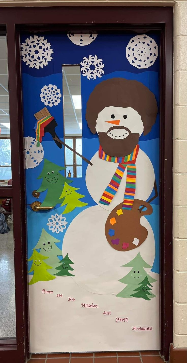 a door decorated to look like a snowman with a beard and scarf on it