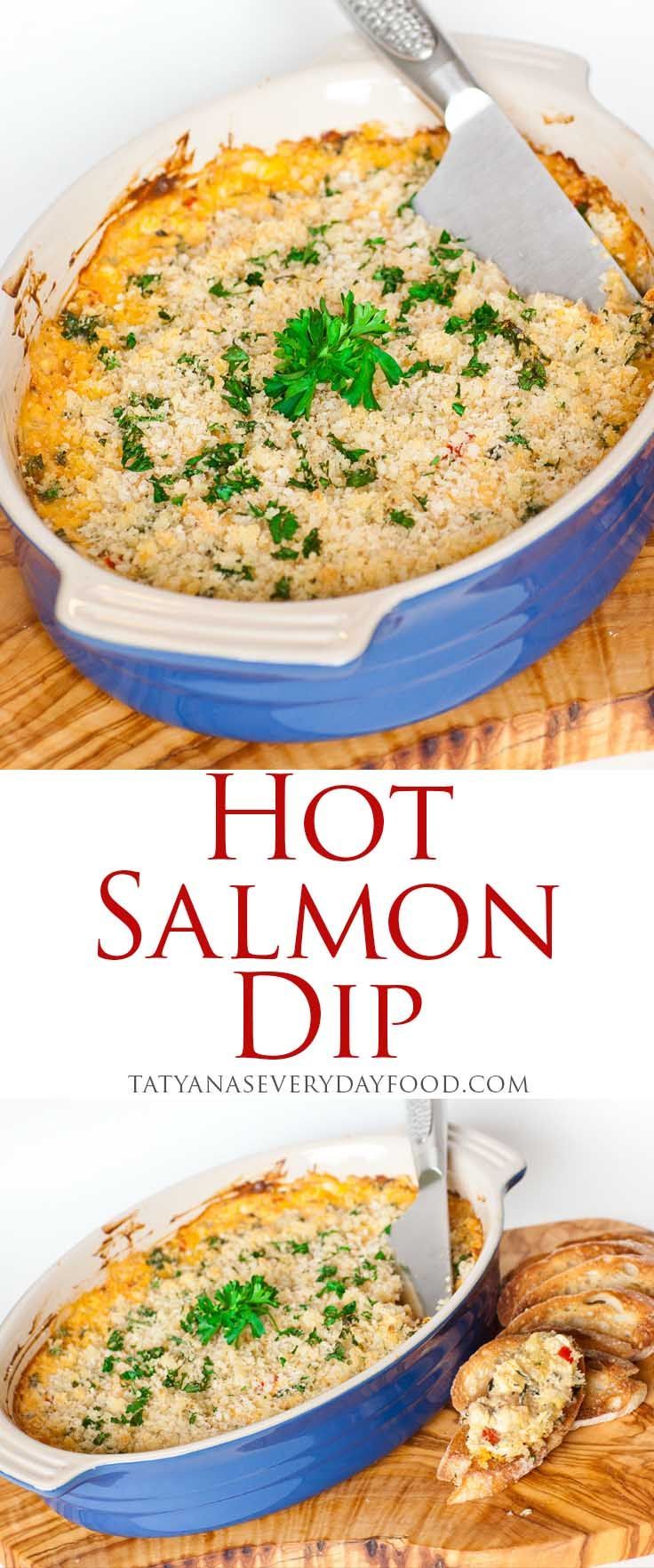 a casserole dish with cheese and parsley on top, in a blue pan