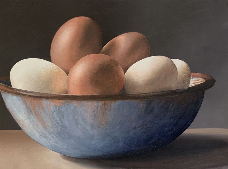 a painting of eggs in a blue bowl