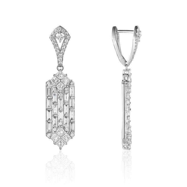 These sparkly earrings are a must-have for everyday wear. Their delicate silhouette makes them perfect for almost any ensemble, and their organic shape brings a touch of nature to your outfit. Fine Jewelry Bridal Drop Earrings, Elegant Formal Earrings With Baguette Diamonds, Refined Drop Earrings For Anniversary, Classic Diamond White Earrings With Baguette Diamonds, Classic Baguette Diamond White Earrings, Single Dangle Diamond Earring, Elegant Baguette Diamond Earrings For Anniversary, Timeless Bridal Earrings With Elegant Design, Single Diamond Dangle Earring