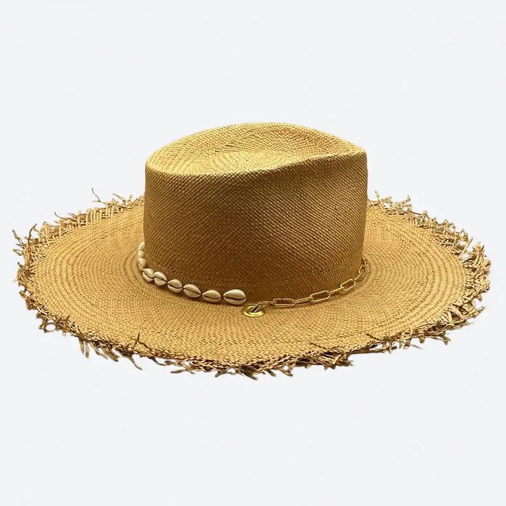 Caress the sun under the shadow of this wide brim straw hat and give to your day that extra Je ne sais quoi that makes you unique... Cowrie Shell charms 18k gold filled clip chain Sweatband with ‘Choose to shine’ inspirational quote All hats are unique and have perfect imperfections! Straw hat hand woven in Ecuador Hand made and designed by Valeria in California Gold Brimmed Straw Hat, Adjustable Gold Panama Hat With Flat Brim, Luxury Gold Wide Brim Hat, Gold Straw Brimmed Hat, Gold Straw Hat With Flat Brim, Luxury Natural Straw Hat For Beach, Adjustable Gold Panama Hat With Wide Brim, Gold Wide Brim Straw Hat, Handmade Gold Wide Brim Hat