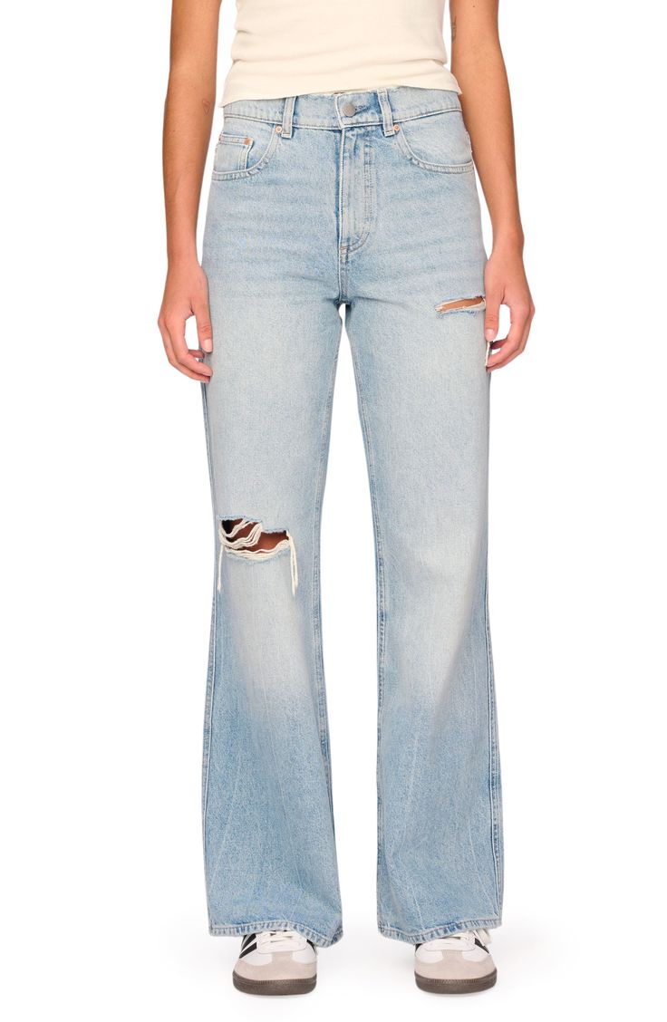 A slashed knee authenticates well-faded jeans cut pure cotton denim with a high-waist fit and a silhouette that tapers at the knee. 31" inseam; 22" leg opening; 12" front rise; 15" back rise (size 29) Zip fly with button closure Five-pocket style 100% cotton Machine wash, dry flat Imported Fitted Distressed Flare Jeans In Rigid Denim, Faded Ripped Flare Jeans For Fall, High Rise Faded Distressed Flare Jeans, High Waist Distressed Cotton Flare Jeans, High Rise Distressed Cotton Jeans, Ripped Light Wash Cotton Jeans, Ripped Light Wash Flare Jeans In Rigid Denim, Ripped Cotton Cutoff Jeans, Ripped Mid-rise Cotton Jeans