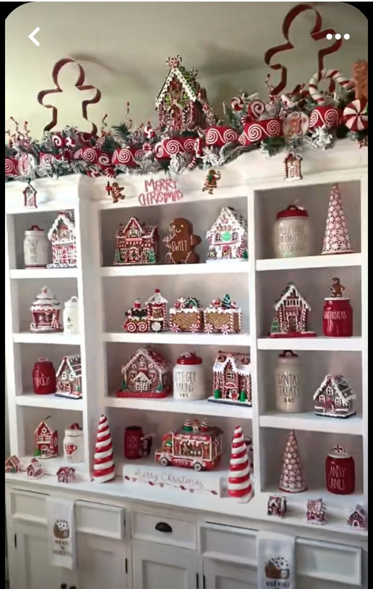 the shelves are decorated with candy canes and gingerbread houses