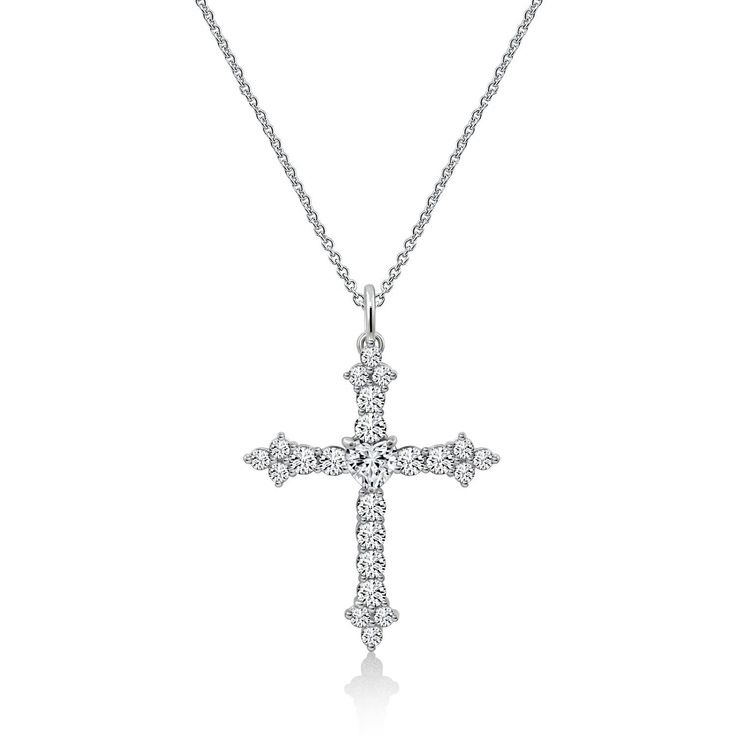 A beautiful symbol of faith, this cross necklace is worth keeping and will become a treasured trinket in your jewelry box. Featuring cubic zirconia of different shapes and a layer of platinum plating, the style is made exquisitely and will shimmer always. CUT & DESIGN: The stunning round-cut & heart-cut stone with prong-setting creates an impressive necklace for holy style STONE: Sparkling clear Cubic Zirconia stone METAL TYPE: Platinum-plated Sterling Silver MEASUREMENT: 18'' cable chai Elegant Silver Cross Necklace, Elegant Crystal Cross Rhinestone Necklace, Elegant Crystal Rhinestone Cross Necklace, Diamond White Cubic Zirconia Necklace With 17 Jewels, Anniversary Cross Pendant Necklace With Cubic Zirconia, Silver Cubic Zirconia Diamond-shaped Necklace, Silver Brilliant Cut Cross Pendant Jewelry, Clear Cubic Zirconia Cross Pendant Necklace, Silver Diamond-shaped Cubic Zirconia Necklace