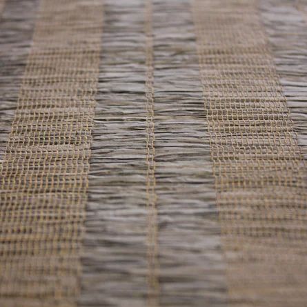 a close up view of woven material on a tablecloth with no pattern or design