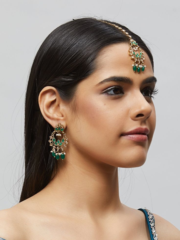 Beautiful kundan earrings with stones and pearls, plus matching mang tikka Traditional Indian Jewelry: Slight Color variations are possible due to lighting and photography. If you are interested in purchasing this item and have any additional questions about this item, please feel free to email us at nazranaanj@gmail.com. For faster responses, call us at 732-283-1808 or WhatsApp us at 609-852-9922 Care instructionsKeep Jewelry away from direct heat, water, perfumes, deodorants and other strong - Traditional Green Kundan Pearl Earrings, Green Kundan Chandbalis For Reception, Jeweled Pearl Earrings For Wedding, Jeweled Pearl Earrings For Wedding And Festivals, Kundan Cutdana Danglers For Reception, Reception Kundan Danglers With Cutdana Details, Reception Kundan Cutdana Danglers, Kundan Danglers For Reception And Diwali, Temple Jewelry Style Danglers With Stone Work For Reception