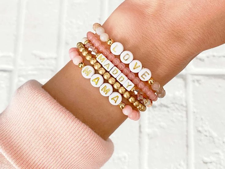 Personalized Word Bracelet Pink Custom Beaded Bracelet - Etsy Round Bead Bracelet Ideas, Word Bracelet Beads Ideas, Easter Bracelets, Name Bracelet Gold, Homemade Bracelets, Bff Bracelets, Multiple Bracelets, Bracelet Stacking, Word Bracelet