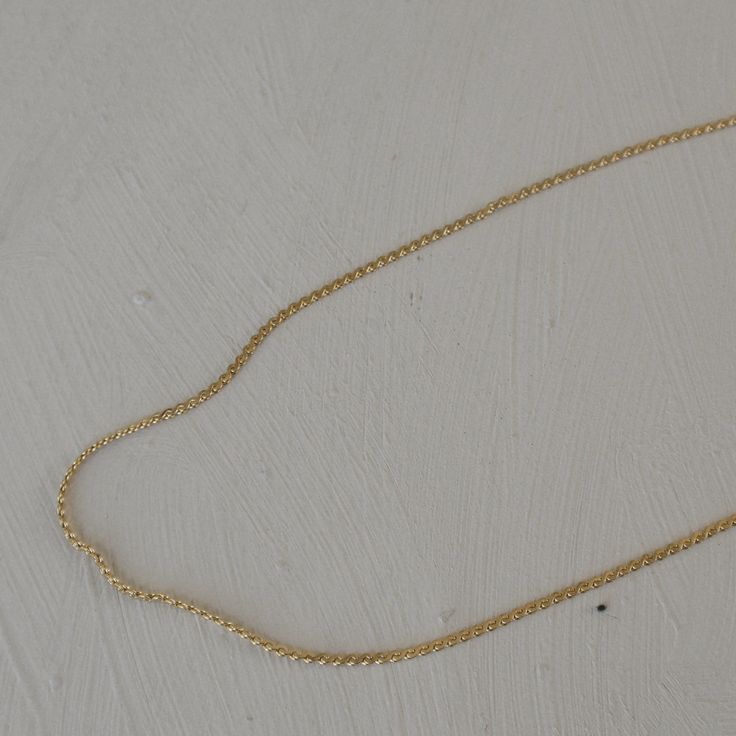 Description Dainty and elegant chain that makes the perfect addition to your layered necklaces. It has a wavy design to it. Material Stainless Steel base 18k PVD gold plating 16 in + 2 in extender How to care for your jewelry: Water resistant but always strongly recommend removing your jewelry before participating in any activities that can lead to contact with moisture or chemicals, such as washing your hands, sleeping in your jewelry, or showering, to maintain shine and ensure a long lifetime. 14k Gold Charm Necklaces With Adjustable Oval Link Chain, 14k Gold Oval Link Charm Necklaces With Adjustable Chain, 14k Gold Charm Necklace With Adjustable Oval Link Chain, Minimalist 14k Gold Delicate Chain Necklace, Yellow Gold Link Charm Necklaces With Adjustable Chain, Dainty Curb Chain Jewelry For Layering, 14k Gold Filled Chain Link Necklace With Adjustable Chain, Minimalist 14k Gold Cable Chain Necklace, Minimalist Necklace With Delicate Chain Link