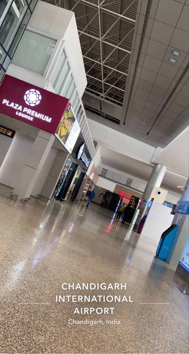 an airport lobby with the words chandigarh international airport