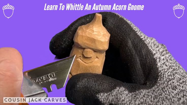 a person holding a pair of scissors in their hand with the words learn to white an autumn acorn bone