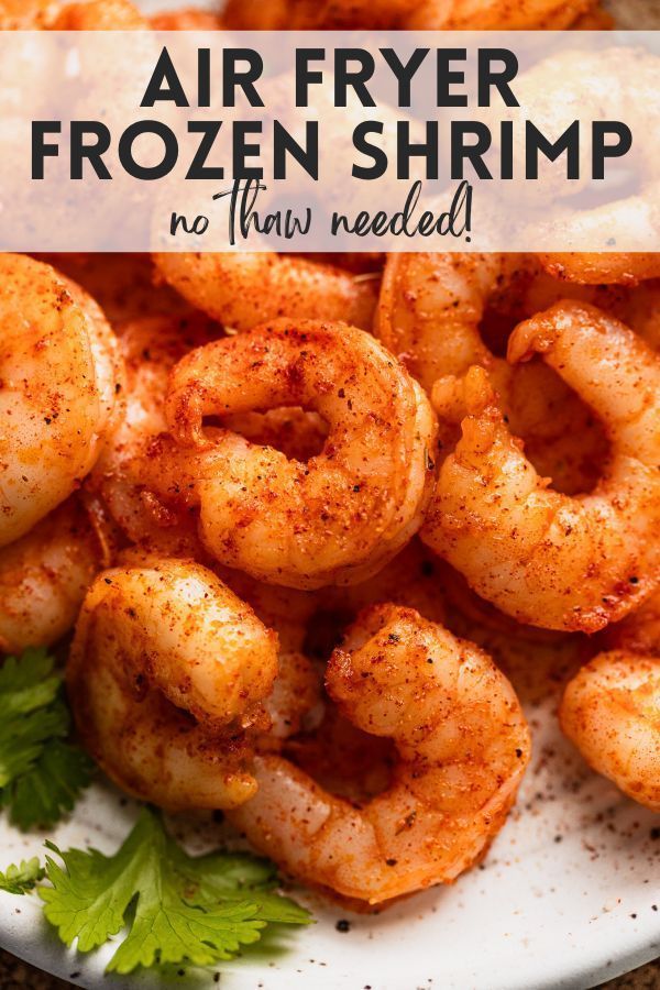 air fryer frozen shrimp on a plate with parsley