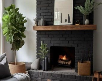 a living room with a couch, fireplace and potted plant on the mantel