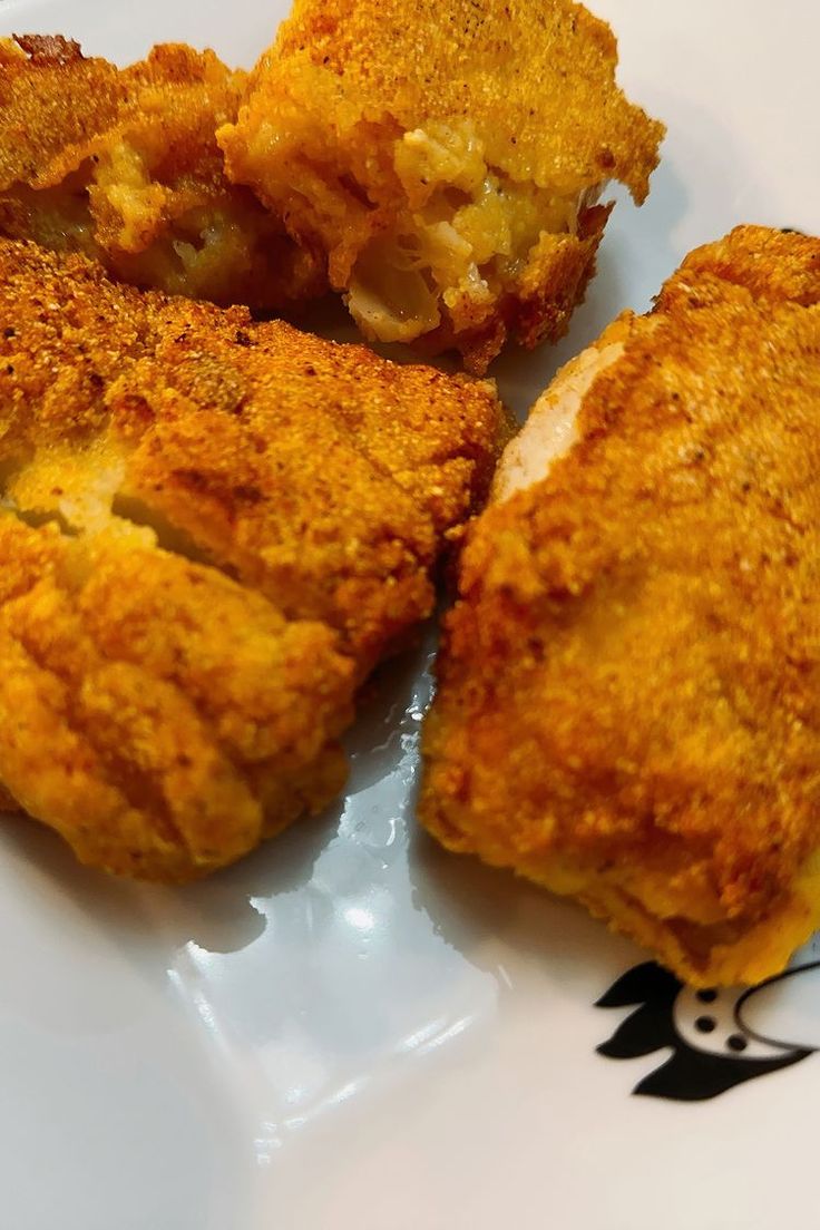 some fried food is on a white plate