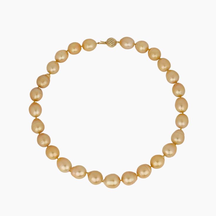 This listing is for one Adele Golden Strand Oval Shape Golden South Sea Pearls Rich Golden color Necklace is 20 inches long Made with 27 beautiful Golden South Sea Pearls Pearls are graduated from 14.6-16.6mm 14kt Solid Gold Ball clasp Knotted with Silk Thread Note: All of our Pearls are natural and therefore, one of a kind. Each pearl will have variations in color, shape and surface that may not be exactly as shown in the image. This makes each piece of jewelry truly unique! Comes with a beauti Classic Gold Oval Pearl Necklace, Classic Oval Gold Pearl Necklace, Classic Oval Single Strand Necklace, Yellow Gold Oval Pearl Necklace, Oval Yellow Gold Pearl Necklace, Classic Yellow Gold Teardrop Pearl Necklace, Classic Oval Yellow Gold Pearl Necklace, Oval Single Strand Necklace For Anniversary, Gold Oval Pearl Necklace