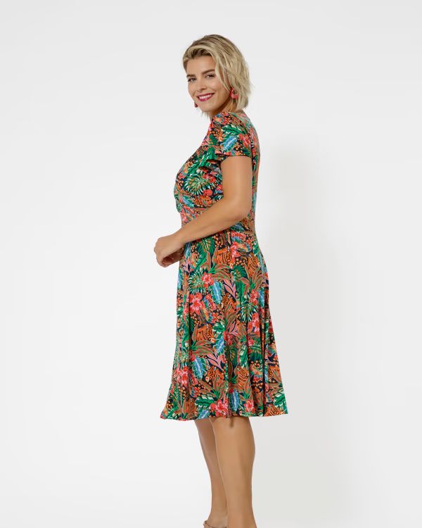 Wear this plus-size faux-wrap dress with mules for a trendy touch. Plus Size Wrap Dress, Skirt Fits, Flutter Sleeve Dress, Faux Wrap Dress, Flutter Sleeves, Days Out, Plus Size Dress, Strappy Heels, Jersey Dress