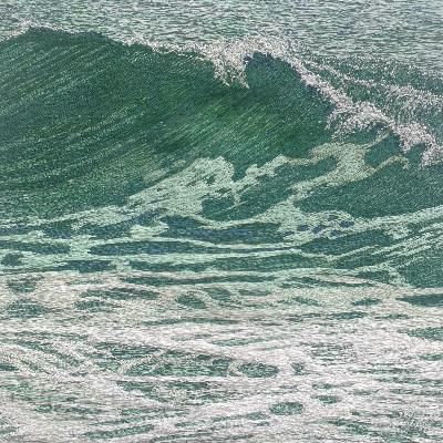 a person riding a surfboard on top of a wave in the ocean with foamy water