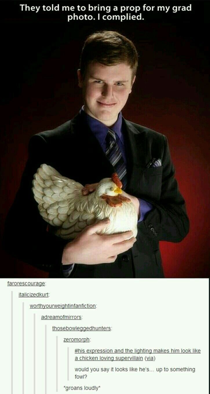 a man in a suit holding a chicken with captioning above it that reads, they told me to bring a prop for my grad