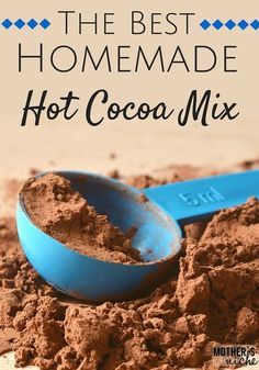 the best homemade hot cocoa mix is in a blue bowl with a spoon on top