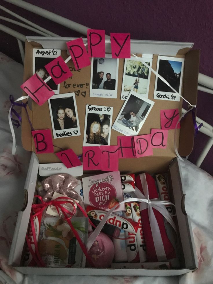 a birthday gift box with pictures and photos on it