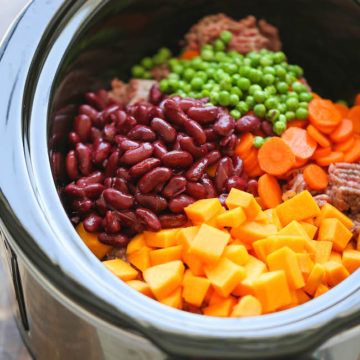 the food is prepared and ready to be cooked in the crock pot or slow cooker