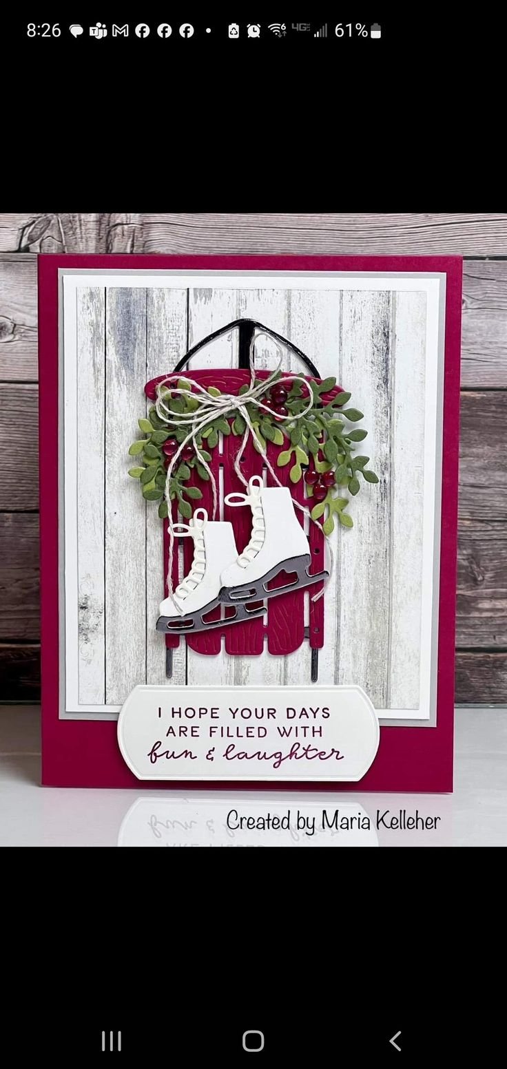 a card with a shoe and plant on it