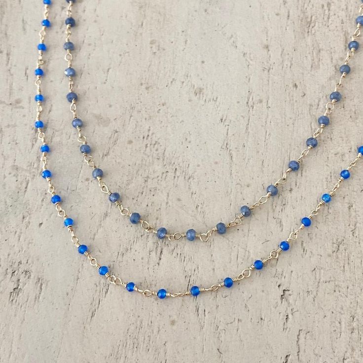 Tiny beads necklace rosary style with either blue chalcedony or sapphire. Length Blue Chalcedony 18" Length Sapphire 19" Blue Sapphire crystals have an excellent energy within the throat chakra to aid your communication ability. Blue chalcedony energies mainly focus on your throat and enables you to speak freely. -This information is intended for spiritual support only Chalcedony beads 3mm Sapphire 3-3.5mm Wire & Findings 14K GF Tiny Beads, Gem Necklace, Throat Chakra, Blue Chalcedony, Beads Necklace, To Speak, Rosary, Blue Sapphire, Turquoise Necklace