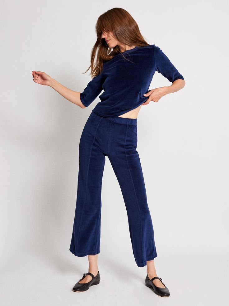 A cropped, flared pant available in velour and French terry, combining retro flair with a classic silhouette. A front and back seam keeps things structured and chic. Suzie Kondi, Kick Flare Pants, Kick Flares, Denim Cotton, Classic Silhouette, Navy Women, British Indian, Flare Pants, Tee Shop