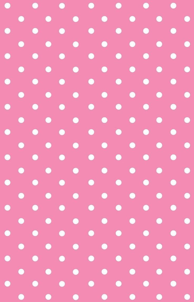 a pink background with white polka dots