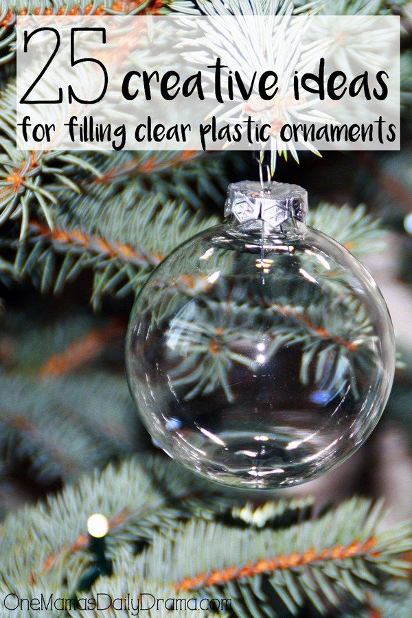 a christmas ornament hanging from a tree with the words 25 creative ideas for filling clear plastic ornaments