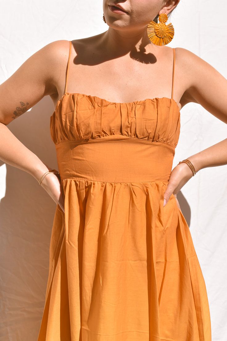 The perfect vacation dress does exist - meet our Wailea Sunset Ombre Maxi Dress! Available in orange and pink, this dramatic ankle-sweeping maxi dress features gorgeous ombre fabric that fades from rich burnt orange to butter yellow, adjustable spaghetti straps and an empire waist. We're pairing with a dramatic gold earring and low bun for your best vacation look yet. 65% Cotton 35% Polyester Summer Maxi Dress With Sweetheart Neckline, Brunch Maxi Dress With Ruched Bodice And Spaghetti Straps, Orange Vacation Dress With Adjustable Straps, Orange Dress With Adjustable Straps For Vacation, Summer Maxi Dress With Ruched Sweetheart Neckline, Summer Maxi Dress With Ruched Bodice And Spaghetti Straps, Summer Maxi Dress With Sweetheart Neckline And Ruched Detail, Orange Summer Dress With Spaghetti Straps, Summer Dress With Spaghetti Straps In Orange