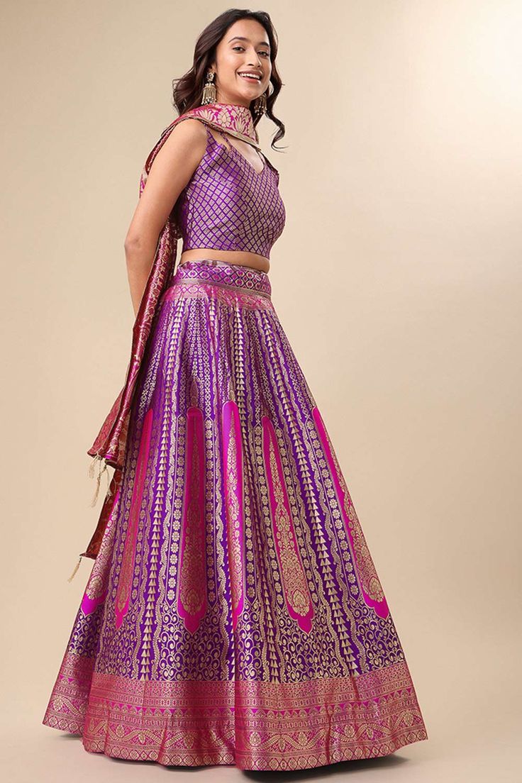 Real beauty comes out from your dressing style with this Dark Green Color Jacqaurd lehenga choli. This ravishing attire is crafted with Banarasi Zari Woven work. IT comes with matching jacquard choli and dupatta. The unstitched choli can be customized from 34 to 42 inches.Product Features: Lehenga Color: Purple Choli Color: Purple Dupatta Color: Purple Lehenga Fabric: Jacquard Choli Fabric: Jacquard Dupatta Fabric: Jacquard Work: Woven Sleeves: Sleeveless Occasion: Festivewear, Wedding Guest Pro Purple Choli, Ready To Wear Lehenga, Purple Lehenga, Reception Bridal Dress, Lehenga Choli For Women, Choli For Women, Wedding Kimono, Global Dress, Lehenga Choli Online