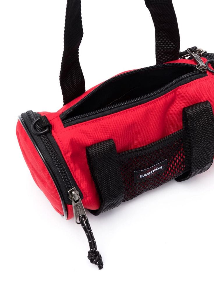 Eastpak x Telfar Cylinder Messenger Bag - Farfetch Bags Logo, Sport Bag, Blue Bags, Small Bags, Side Zip, Messenger Bag, Black Red, Duffle Bag, Shoulder Strap