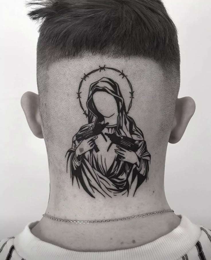 a man with a tattoo on his head