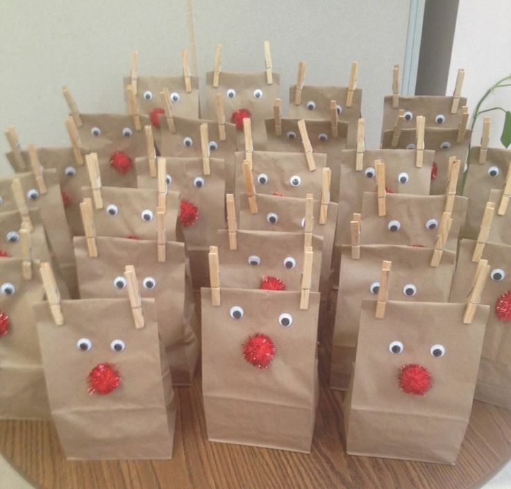 brown paper bags with eyes and noses on them