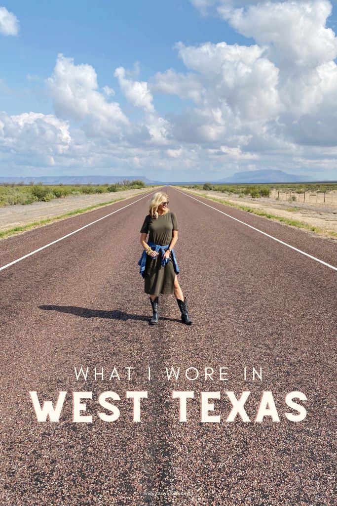 a woman standing in the middle of an empty road that says, what i wore in west texas