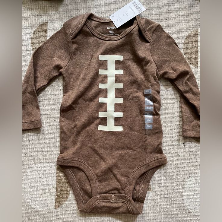 Nwt! For The Littlest Football Fan Size 9 Months. Brown Onesie For Playtime In Fall, Brown Fall Onesie For Playtime, Fall Playwear Onesie, Cute Brown Tops For Playwear, Fall Playtime Brown Onesie, Fitted Tops For Fall Playwear, Brown Long Sleeve Tops For Playtime, Cute Brown Tops For Playtime, Strawberry Romper